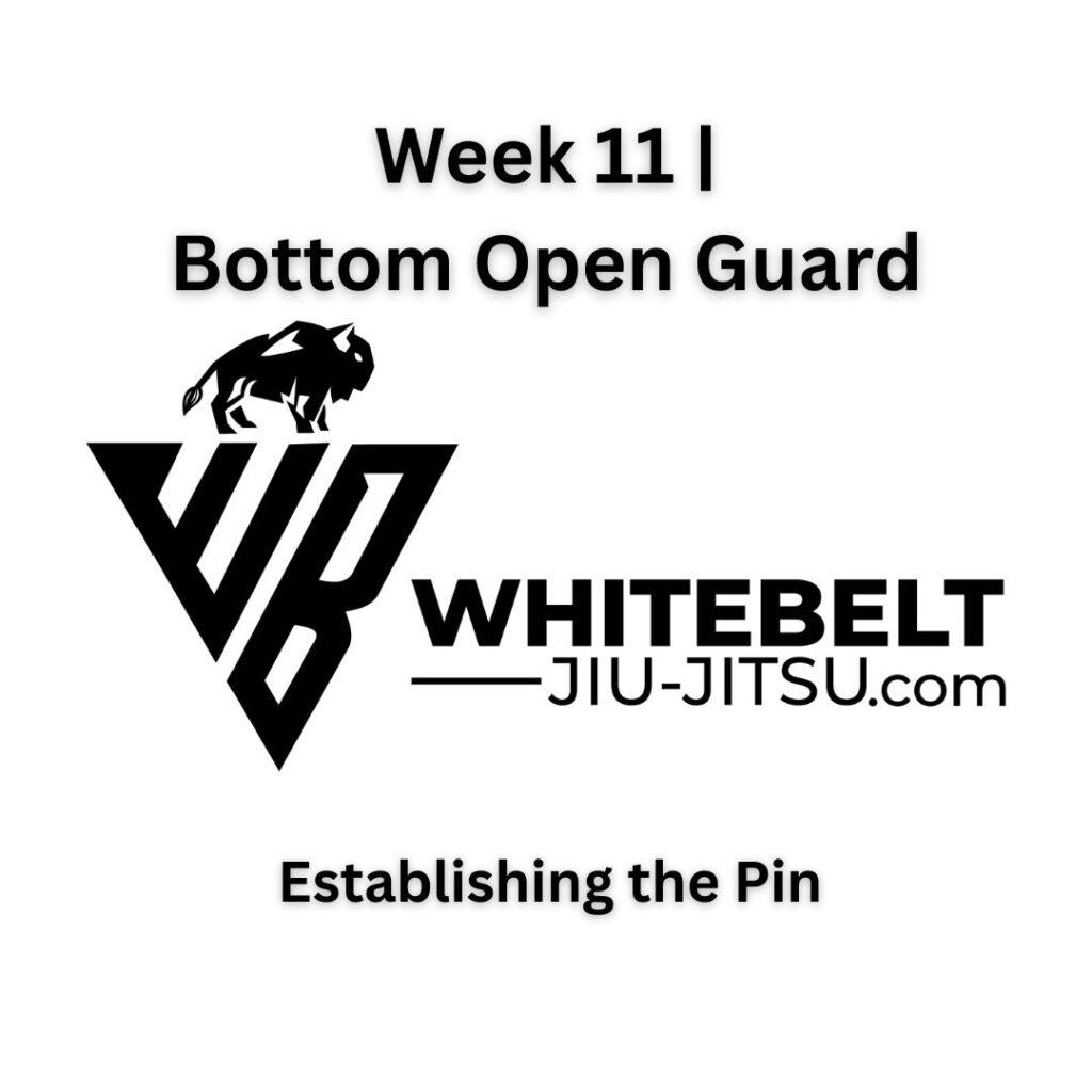 White belt BJJ student practicing top half guard control as part of Module 1 fundamentals.