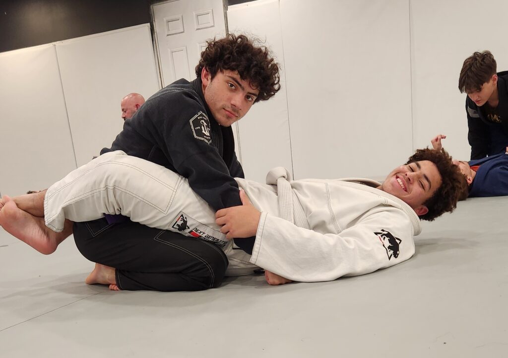 Adult Brazilian Jiu Jitsu students training together in Thibodaux Louisiana