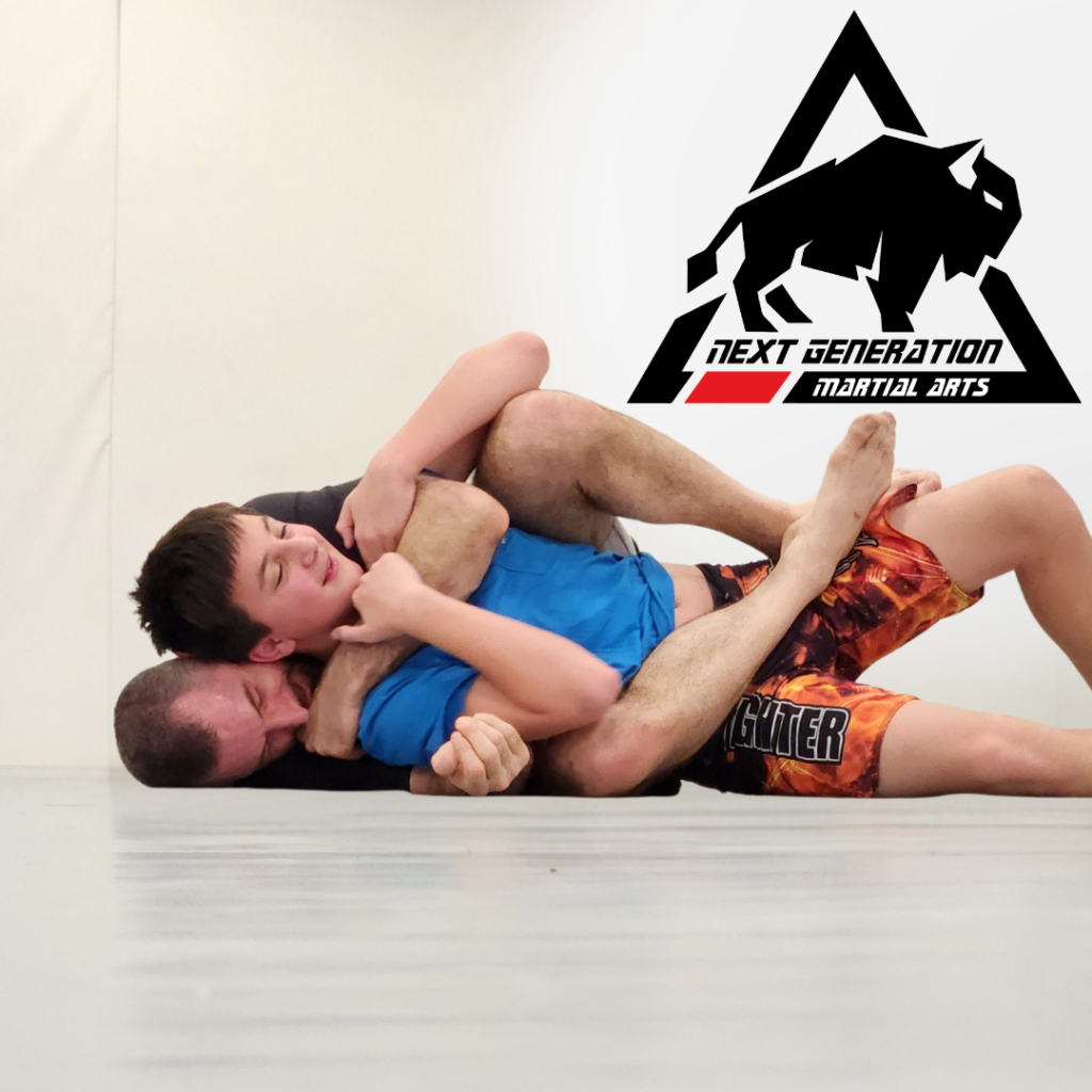 Father and son training together in family martial arts in Thibodaux