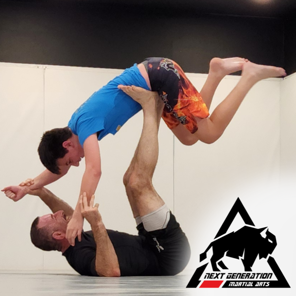 Parent and child training together during family martial arts in Thibodaux