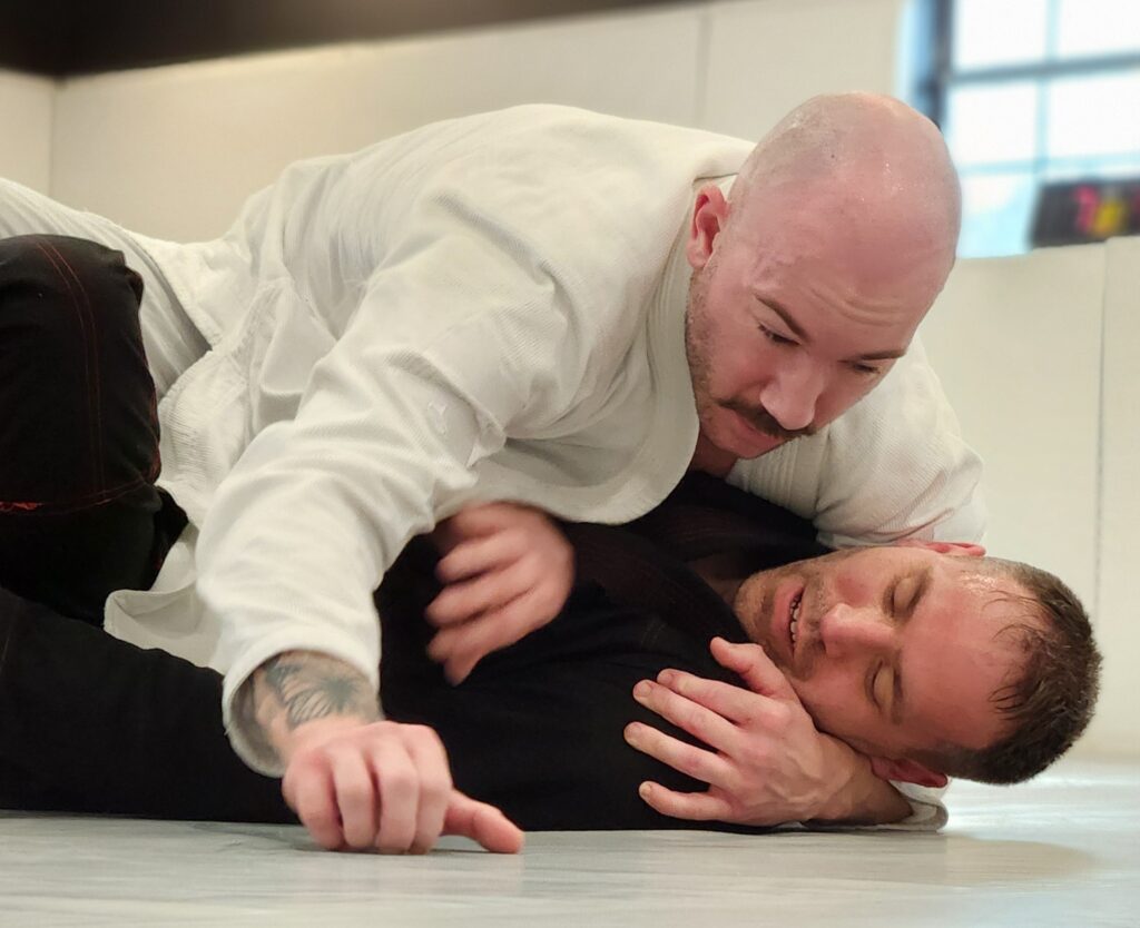 Adult students practicing controlled Brazilian Jiu Jitsu training in Thibodaux